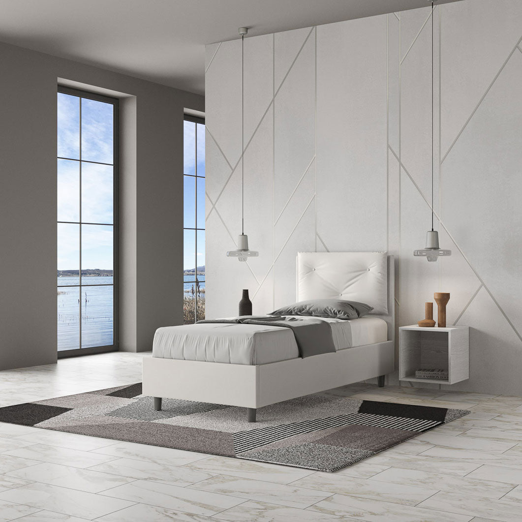Callisto - Letto moderno singolo rivestito con cuscino removibile cm 95x202x110h - vari modelli