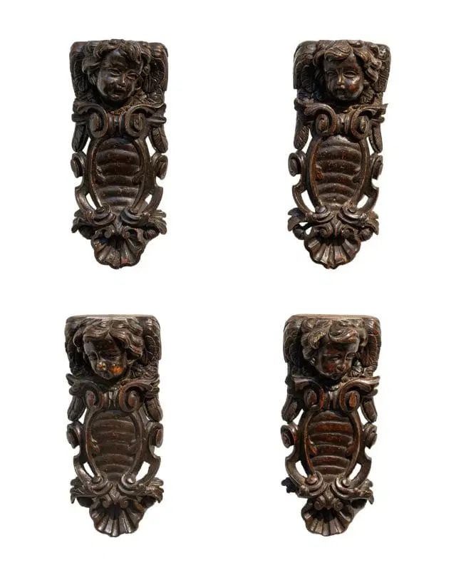 XVII secolo, Quattro fregi con teste di putto e stemmi